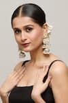 Buy_Chaotiq By Arti_White Stone Carved Floral Jhumka Earrings _Online_at_Aza_Fashions