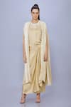 Buy_DILNAZ_Beige Blended Satin Solid Draped Skirt _at_Aza_Fashions