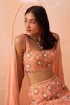 PARUL GANDHI_Peach Satin Georgette Hand Embroidered Floral Motifs Blouse Mermaid Lehenga Set _at_Aza_Fashions