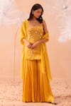 Buy_PARUL GANDHI_Yellow Satin Georgette Hand Embroidered Floral Round Jaune Kurta Sharara Set _at_Aza_Fashions