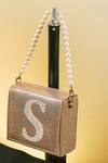 Buy_NR By Nidhi Rathi_Gold Crystal S Letter Embellished Clutch_at_Aza_Fashions