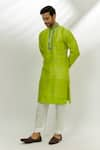 Buy_Nadima Saqib_Green Raw Silk Embroidered Mirror Work Placement Kurta _Online_at_Aza_Fashions