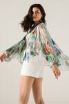 Buy_REENA SHARMA_Off White Viscose Crinkled Chiffon Printed Abstract Tie-up Neck Advika Top _Online_at_Aza_Fashions