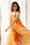 Shop_REENA SHARMA_Orange Viscose Crinkled Chiffon Printed Floral Round Vaani Midi Dress _Online_at_Aza_Fashions