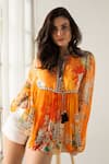 Shop_REENA SHARMA_Orange Viscose Crinkled Chiffon Printed Floral Tie-up Neck Vaani Top_Online_at_Aza_Fashions