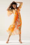 Buy_REENA SHARMA_Orange Viscose Crinkled Chiffon Printed Floral V Neck Vaani Pattern Midi Dress _at_Aza_Fashions