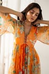 Buy_REENA SHARMA_Orange Viscose Crinkled Chiffon Printed Floral V Neck Vaani Pattern Midi Dress _Online_at_Aza_Fashions