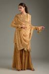 Buy_Label Deepshika Agarwal_Beige Tissue, Silk, Organza Tassels, Embroidery, Zari Round Kurta Sharara Set _at_Aza_Fashions