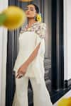 Shop_Label Deepshika Agarwal_White Couture Silk Embroidered 3d Floral V Neck Top And Flared Pant Set _Online_at_Aza_Fashions