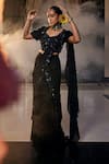 Buy_Label Deepshika Agarwal_Black Georgette Lining Taffeta Bloom Tiered Pre-draped Saree With Blouse_at_Aza_Fashions