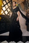 Shop_Label Deepshika Agarwal_Black Georgette Lining Taffeta Bloom Tiered Pre-draped Saree With Blouse_at_Aza_Fashions