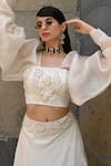 Shop_Label Deepshika Agarwal_Off White Couture Organza Lining Taffeta Dahlia Patch Lehenga With Blouse_Online_at_Aza_Fashions