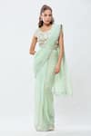 Buy_Samyukta Singhania_Green Shimmer Georgette Embroidery Sequin Border Pre-draped Saree With Blouse _at_Aza_Fashions