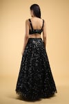 Shop_Samyukta Singhania_Black Net Embroidery Sequin Sweetheart Neck Wave Lehenga Set _at_Aza_Fashions