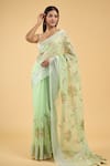 Samyukta Singhania_Green Linen Blend Hand Painted Bloom Saree With Running Blouse _Online_at_Aza_Fashions