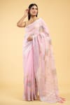 Samyukta Singhania_Pink Linen Blend Hand Painted Bloom Tassel Bordered Saree With Running Blouse _Online_at_Aza_Fashions