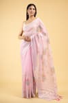 Buy_Samyukta Singhania_Pink Linen Blend Hand Painted Bloom Tassel Bordered Saree With Running Blouse _Online_at_Aza_Fashions