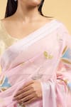 Samyukta Singhania_Pink Linen Blend Hand Painted Bloom Tassel Bordered Saree With Running Blouse _at_Aza_Fashions