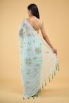 Shop_Samyukta Singhania_Blue Linen Blend Hand Painted Floral Tassel Bordered Saree With Running Blouse _at_Aza_Fashions