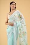 Buy_Samyukta Singhania_Blue Linen Blend Hand Painted Floral Tassel Bordered Saree With Running Blouse _Online_at_Aza_Fashions