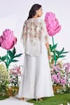 Shop_Nea by Nikita Tiwari_White Raw Silk Hand Embroidered Lotus Plunge-v Cape With Sharara Set_at_Aza_Fashions