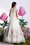 Shop_Nea by Nikita Tiwari_White Raw Silk Hand Embroidered Lotus Plunge Lehenga Set With Cape_at_Aza_Fashions