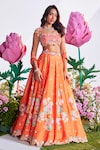 Buy_Nea by Nikita Tiwari_Orange Raw Silk Hand Embroidered Lotus Cutout Print Lehenga Set _at_Aza_Fashions