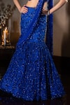 Shop_Isa By Dolly Wahal_Blue Net Hand Embroidery Sequins Leaf Neck Firefly Fishcut Lehenga Set _Online_at_Aza_Fashions