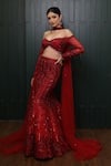 Buy_Isa By Dolly Wahal_Red Net Hand Embroidery Sequins Off-shoulder Fishcut Lehenga Set _at_Aza_Fashions