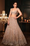 Isa By Dolly Wahal_Gold Net Hand Embroidery Sequins Sweetheart Chrome Lehenga Set _Online_at_Aza_Fashions