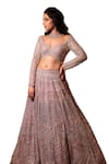 Isa By Dolly Wahal_Purple Net Hand Embroidery Sequins Leaf Neck Luna Lehenga Set _Online_at_Aza_Fashions