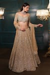 Buy_Isa By Dolly Wahal_Gold Net Hand Embroidery Sequins Off-shoulder Geometric Lehenga Set _at_Aza_Fashions