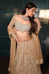 Isa By Dolly Wahal_Gold Net Hand Embroidery Sequins Off-shoulder Geometric Lehenga Set _at_Aza_Fashions