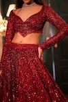 Buy_Isa By Dolly Wahal_Red Net Hand Embroidery Sequins Leaf Neck Mira Trail Lehenga Set _Online_at_Aza_Fashions