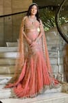 Buy_Isa By Dolly Wahal_Peach Net Hand Embroidery Sequins Sweetheart Coral Fishcut Lehenga Set _at_Aza_Fashions