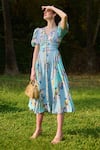 Shop_Verano by Tanya_Blue Cotton Linen Printed Floral V-neck Marina Flared Dress_at_Aza_Fashions