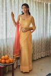 Buy_Kapraaaha_Yellow Chiffon Print Floral Round Contrast Pallu Saree With Blouse_at_Aza_Fashions