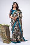 Buy_AAMRA BY LAVANYA_Ivory Silk Hand Bharatanatyam Pattern Saree With Unstitched Blouse Piece _at_Aza_Fashions