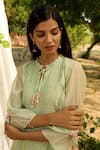 Priti Prashant_Green Mul Cotton Silk Printed Floral Round Baya Smocked Kurta Pant Set _at_Aza_Fashions