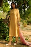 Priti Prashant_Yellow Mul Cotton Silk Printed Floral Round Baya Smocked Front Kurta Set _at_Aza_Fashions