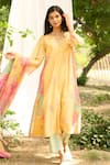 Buy_Priti Prashant_Yellow Mul Cotton Silk Printed Floral V Neck Rajhans Embroidered Kurta Set _at_Aza_Fashions