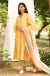 Priti Prashant_Yellow Mul Cotton Silk Printed Floral V Neck Rajhans Embroidered Kurta Set _at_Aza_Fashions