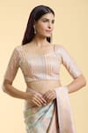 Shop_Samyukta Singhania_Peach Poly Blend Embroidered Floral Leaf Neck Stripe Thread Blouse _Online_at_Aza_Fashions