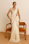 Buy_Studio Iris India_Ivory Georgette Embroidered Sequin Magnolia Pre-draped Saree With Blouse_at_Aza_Fashions