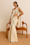 Studio Iris India_Ivory Georgette Embroidered Sequin Magnolia Pre-draped Saree With Blouse_Online_at_Aza_Fashions