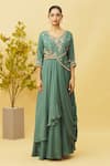 Samyukta Singhania_Blue Dola Silk Embroidered Floral V Neck Thread And Draped Gown _Online_at_Aza_Fashions