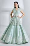 Buy_Anushree Reddy_Green Net Pearls, Sequins V-neck Mughal Embroidered Peplum Jacket And Lehenga Set_at_Aza_Fashions