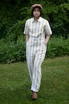 Buy_The Terra Tribe_Yellow Linen Twill Printed Striped Collar Pattern Jumpsuit _at_Aza_Fashions