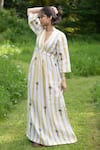 The Terra Tribe_Yellow Linen Printed Striped V Neck Pattern Flared Dress _at_Aza_Fashions