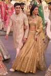 Buy_Abhinav Mishra_Gold Blouse Net Embellished Mirror Scallop V Neck Stripe Bridal Lehenga Set_at_Aza_Fashions